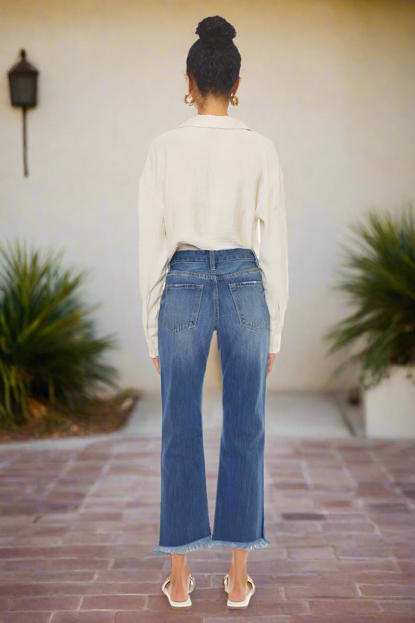 MOM JEANS FRINGE BOTTOM